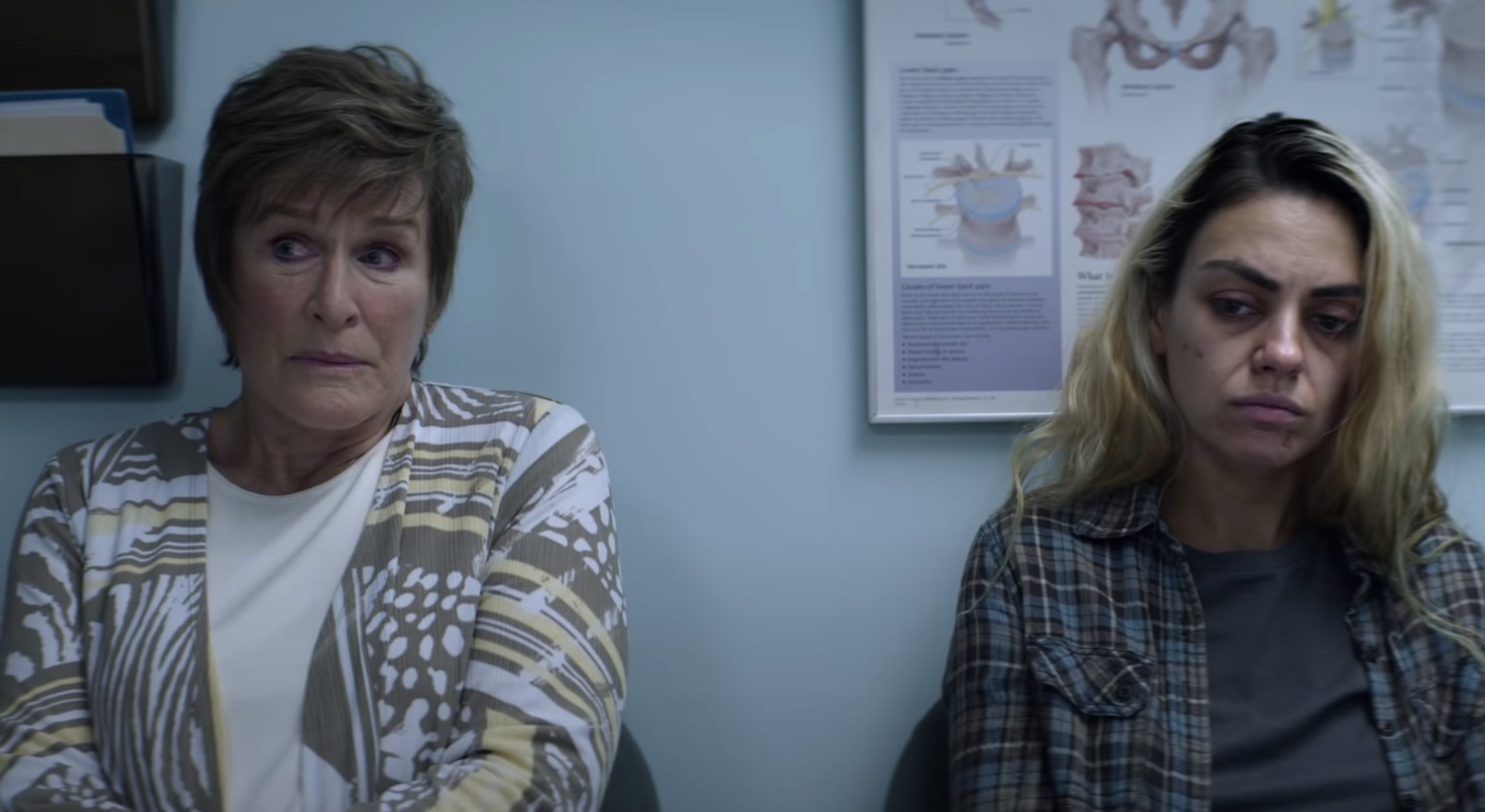 Mila&#x27;s character sits next to her mother in a doctor&#x27;s office