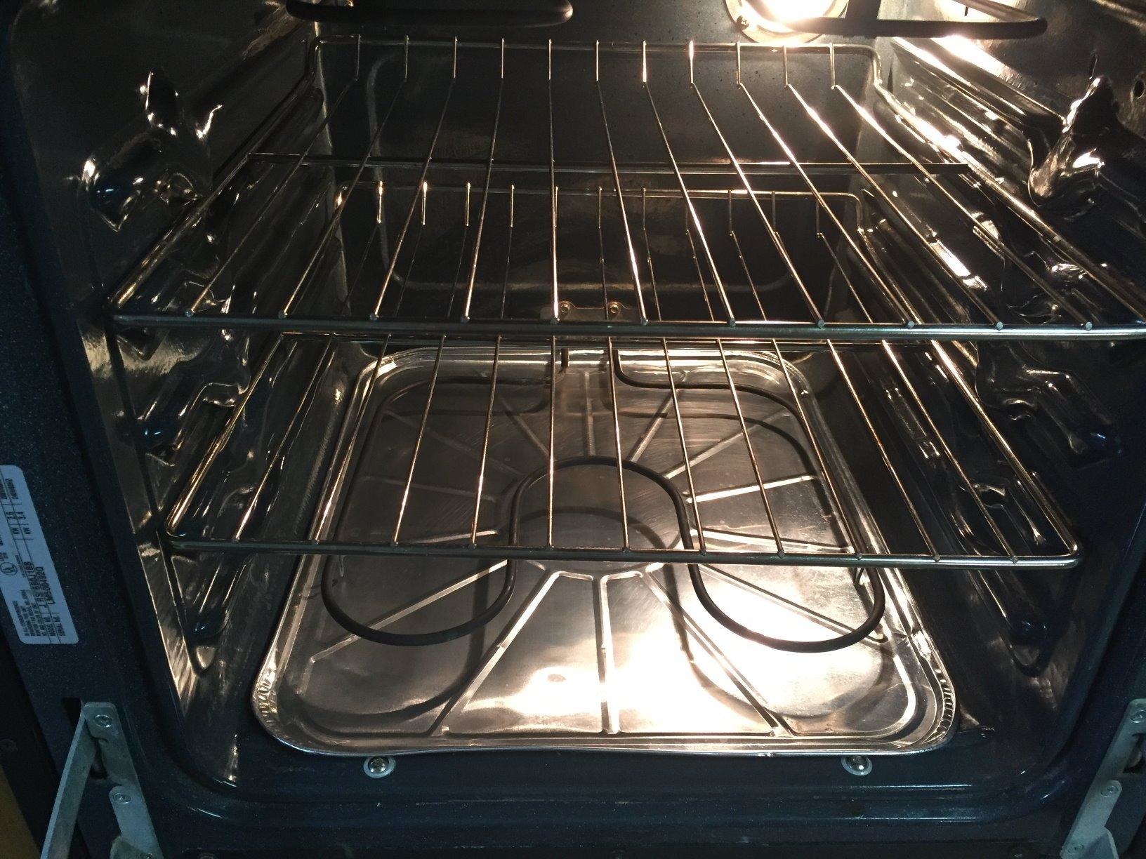 Reviewer photo of disposable oven liner placed at bottom of oven