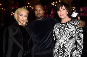 (L to R) Kim Kardashian, Kanye West and Kris Jenner attend the Balmain show as part of the Paris Fashion Week Womenswear Fall/Winter 2015/2016 on March 5, 2015