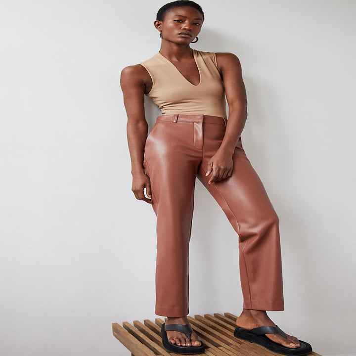 model wearing the camel colored pants