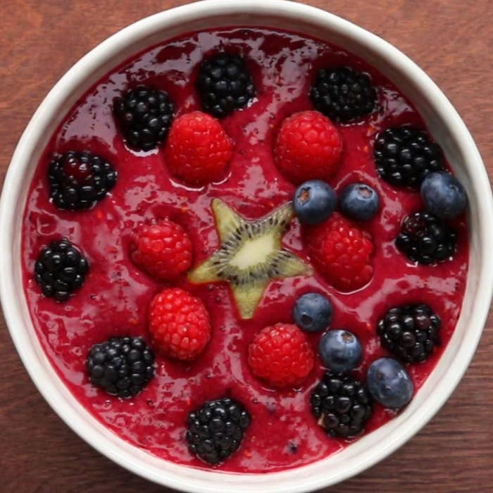 A smoothie bowl topped with fruits