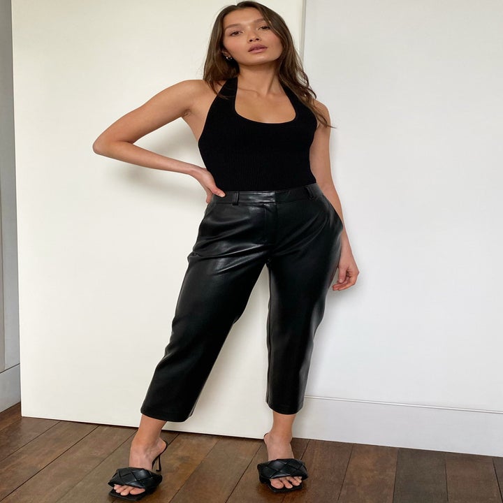 model wearing the black cropped pant 