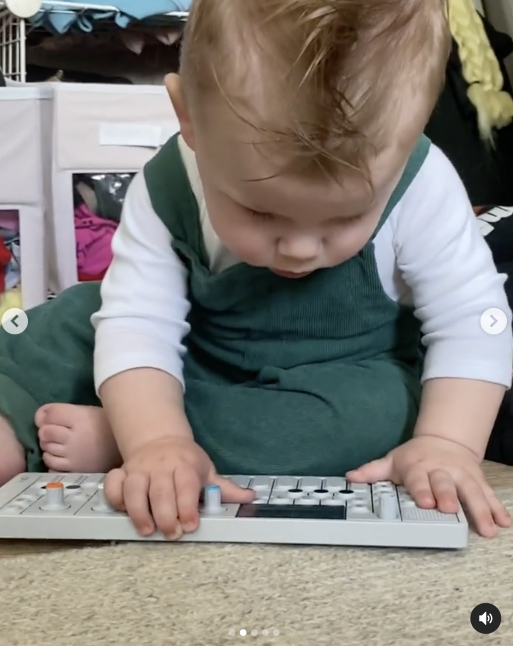 Lil X looking at the keyboard