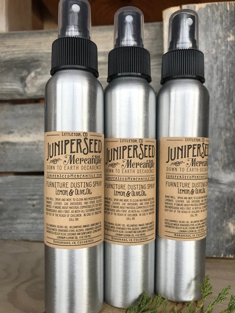 three stainless steel bottles of the spray