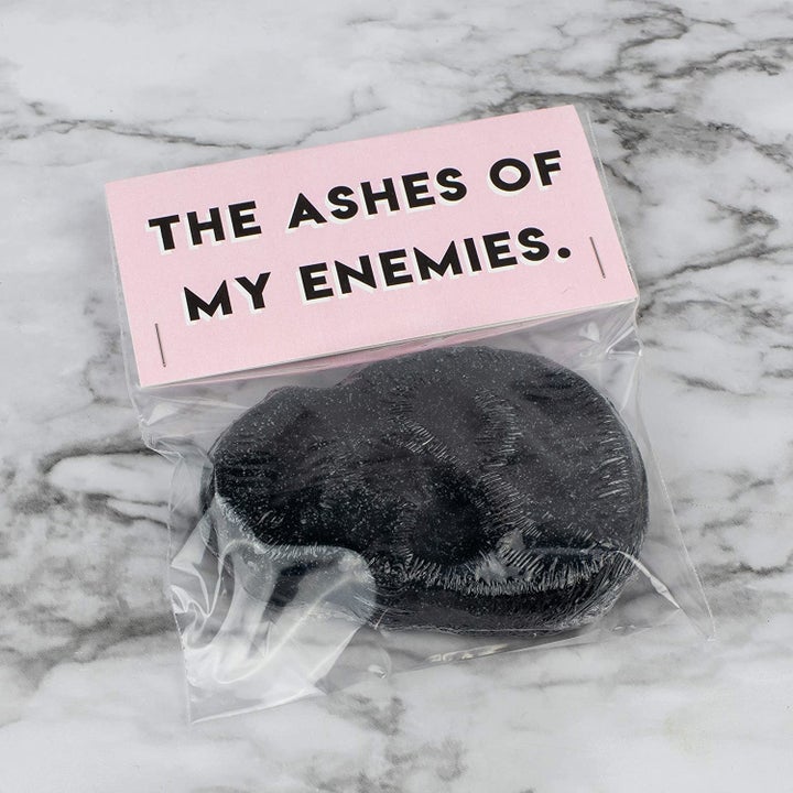 The bath bomb in packaging that says "the ashes of my enemies"