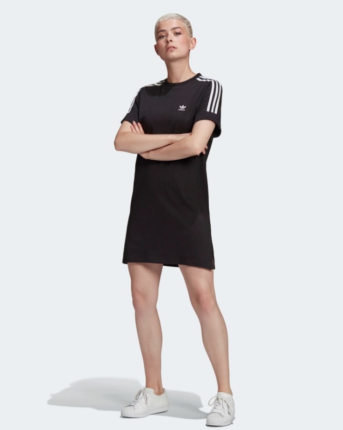 Model wearing black t shirt dress