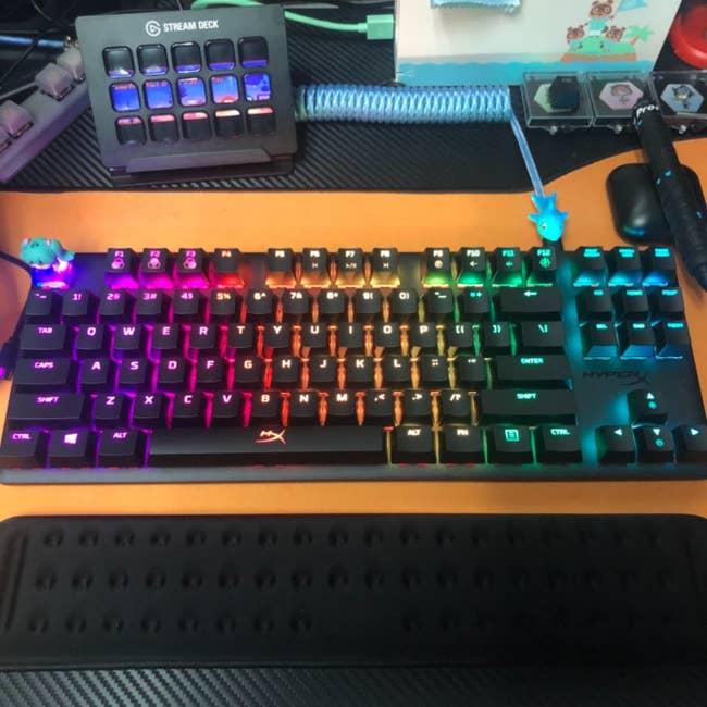 a reviewer's backlit rainbow keyboard