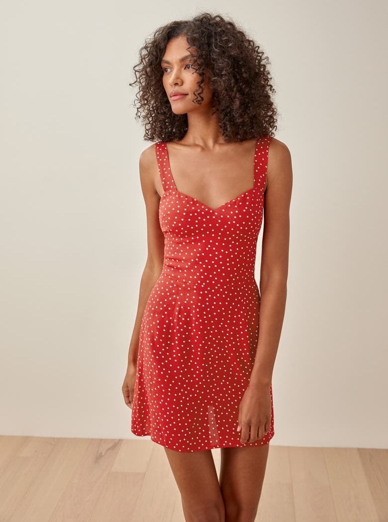 Model wearing the red and white polka dot