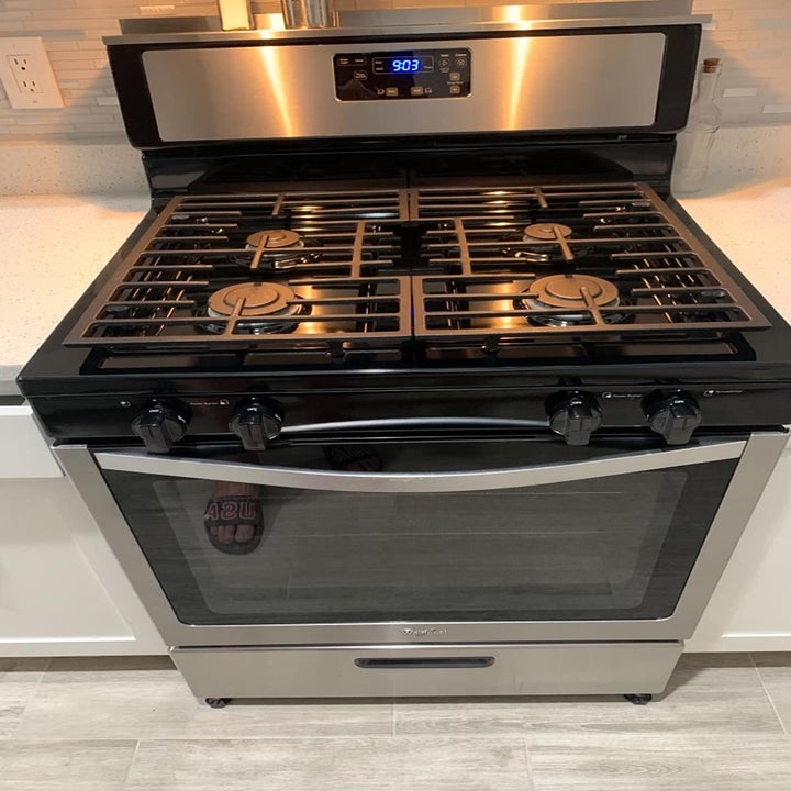 Reviewer photo of stove after cleaning with Weiman Stainless Steel wipes