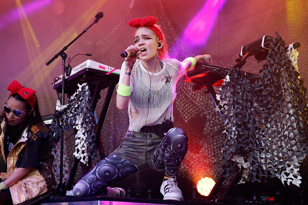 Grimes performing onstage