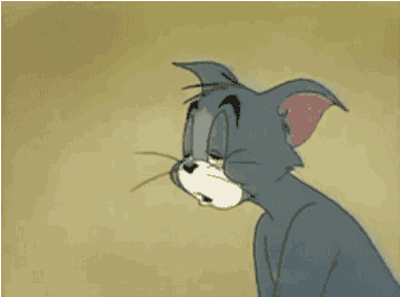 Tom of Tom and Jerry trying to hold his eyes open with tape