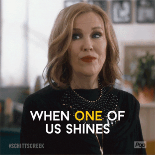 Moira from Schitt&#x27;s Creek saying when one of us shine all of us shine