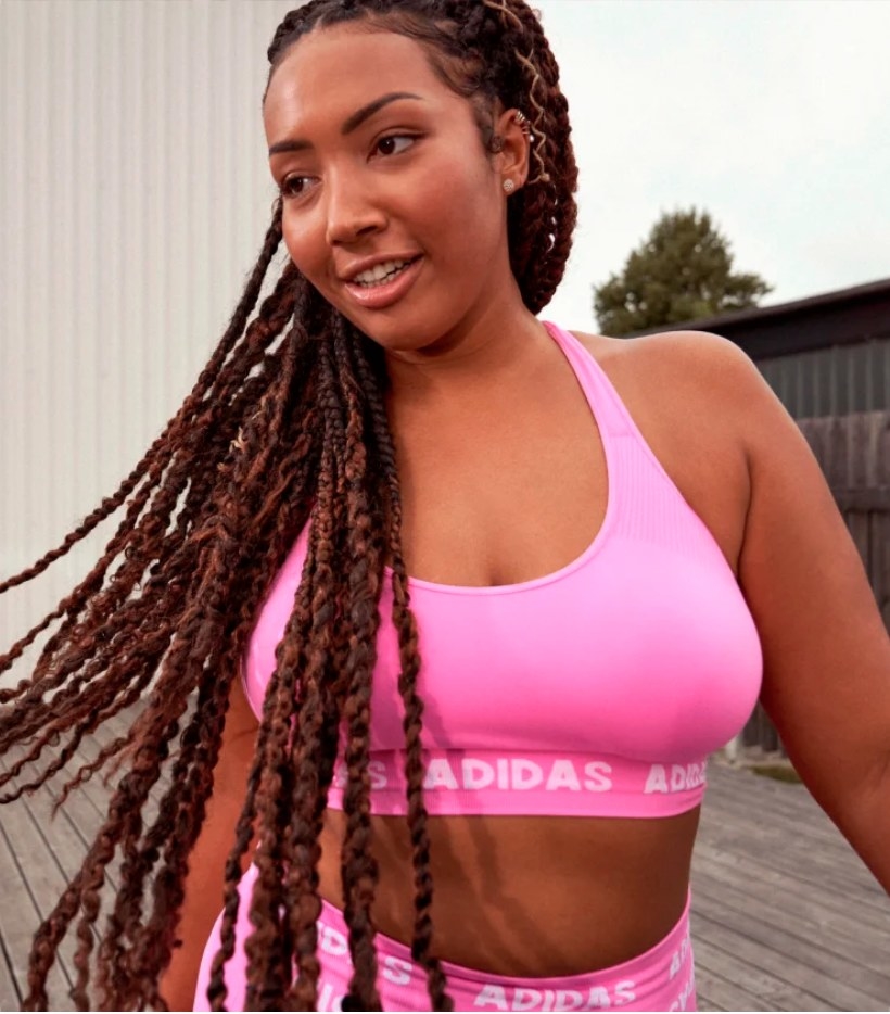 Model wearing pink sports bra