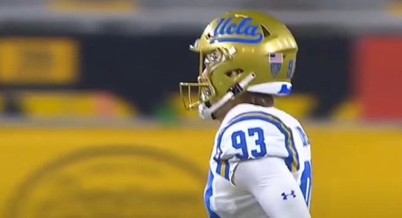Gold helmet with blue, cursive letters &quot;UCLA&quot;