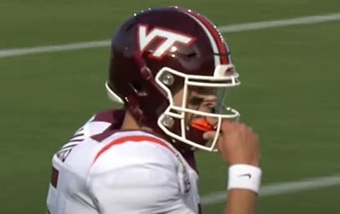 Chicago maroon helmet with the white letters &quot;VT&quot; connected