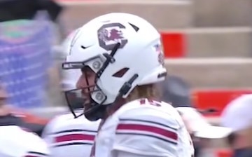 White helmet with a black &quot;C&quot; and a red gamecock inside