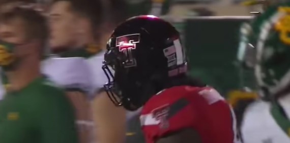 Black helmet with two red &quot;T&#x27;s&quot; overlapping each other