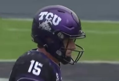 Purple helmet with the white letters &quot;TCU&quot; above a horned frog