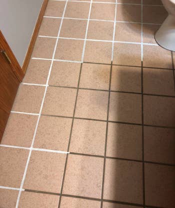 A customer review photo showing the progress on their grout