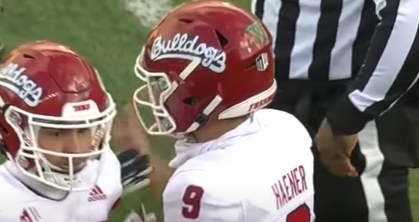 Red helmet with the white word &quot;Bulldogs&quot; in cursive