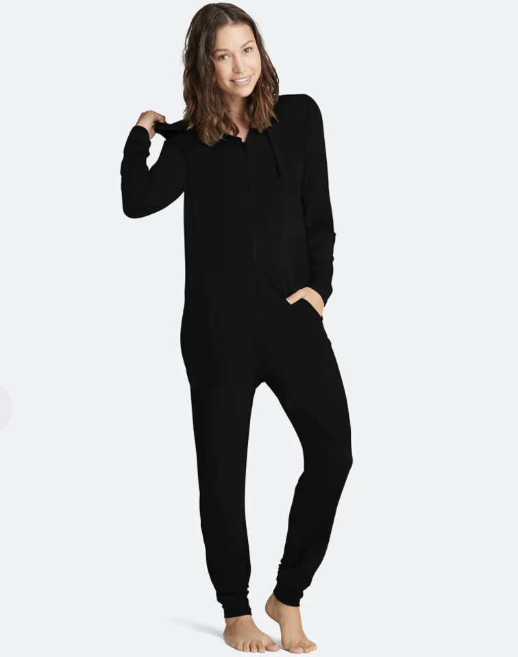 model wearing black onesie