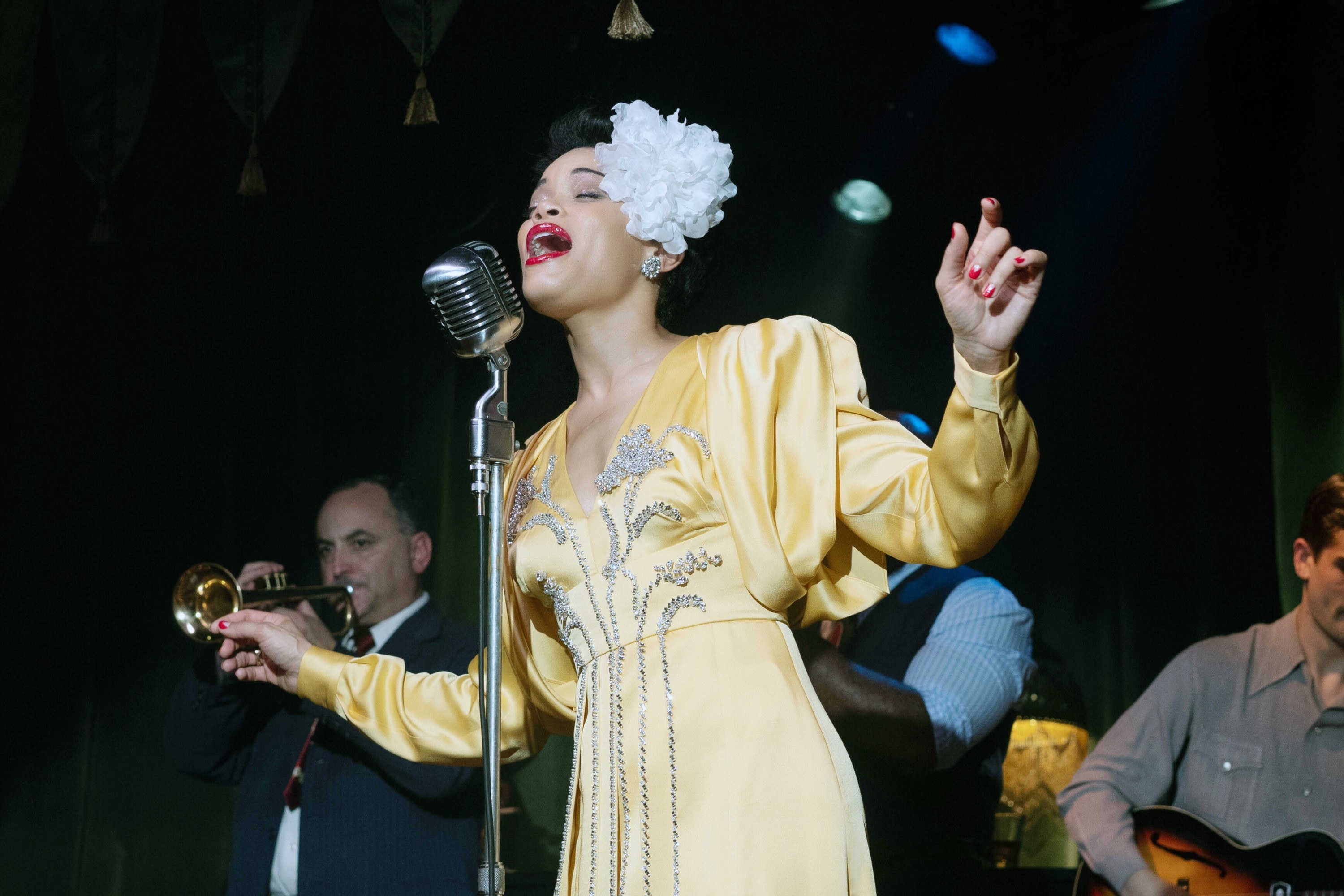 Andra performing on stage as Billie Holiday