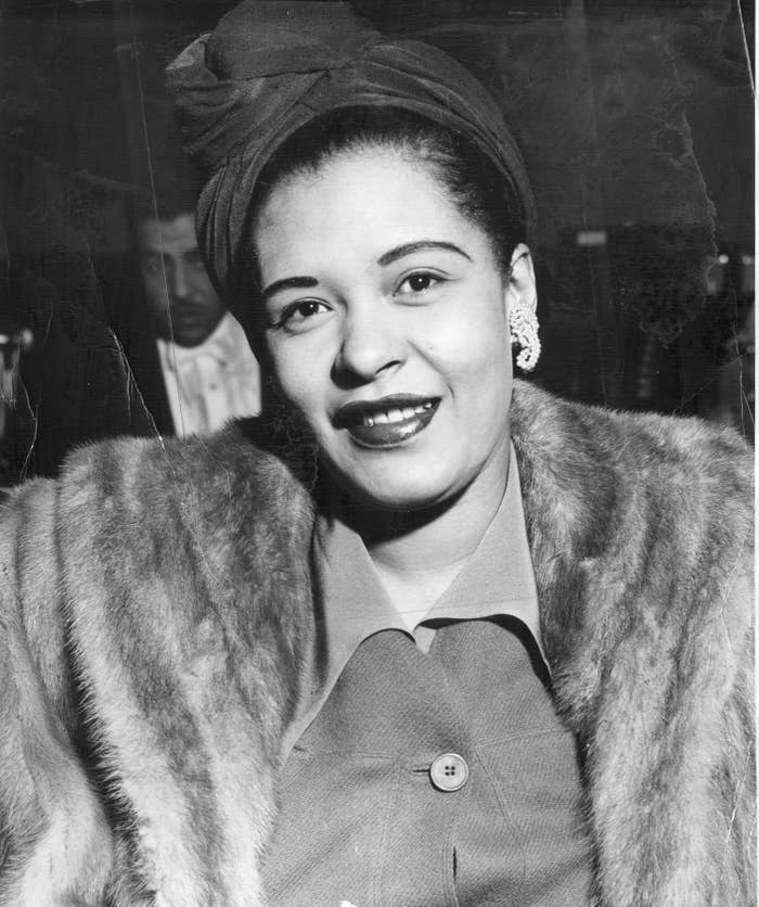 Billie Holiday smiling in fur coat