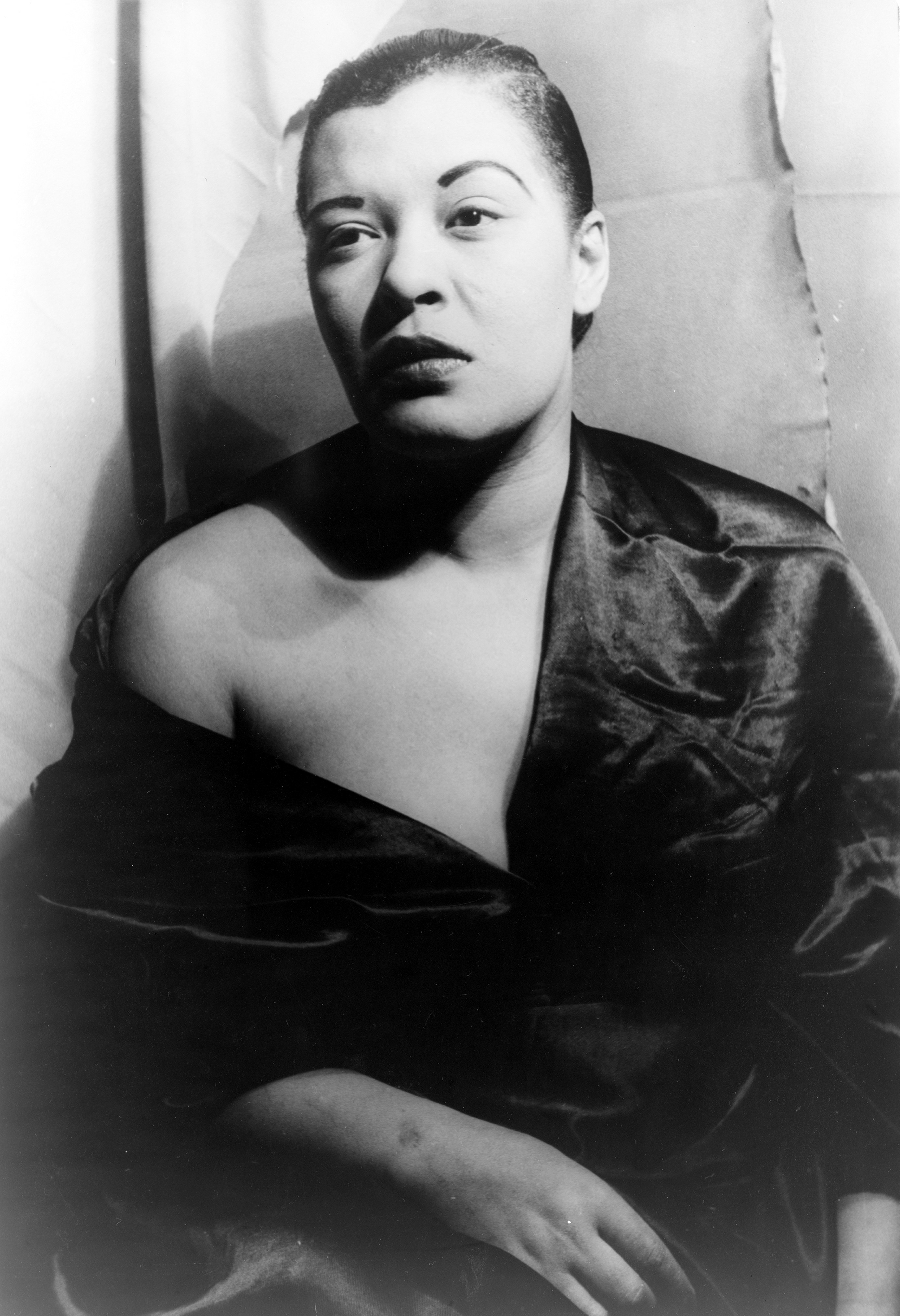 Portrait of Billie Holiday gazing away from the camera