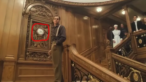 Jack standing beside a clock that reads 2:20