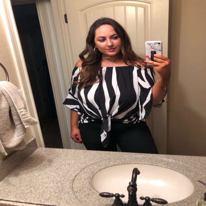 reviewer in same top with black-and-white stripes