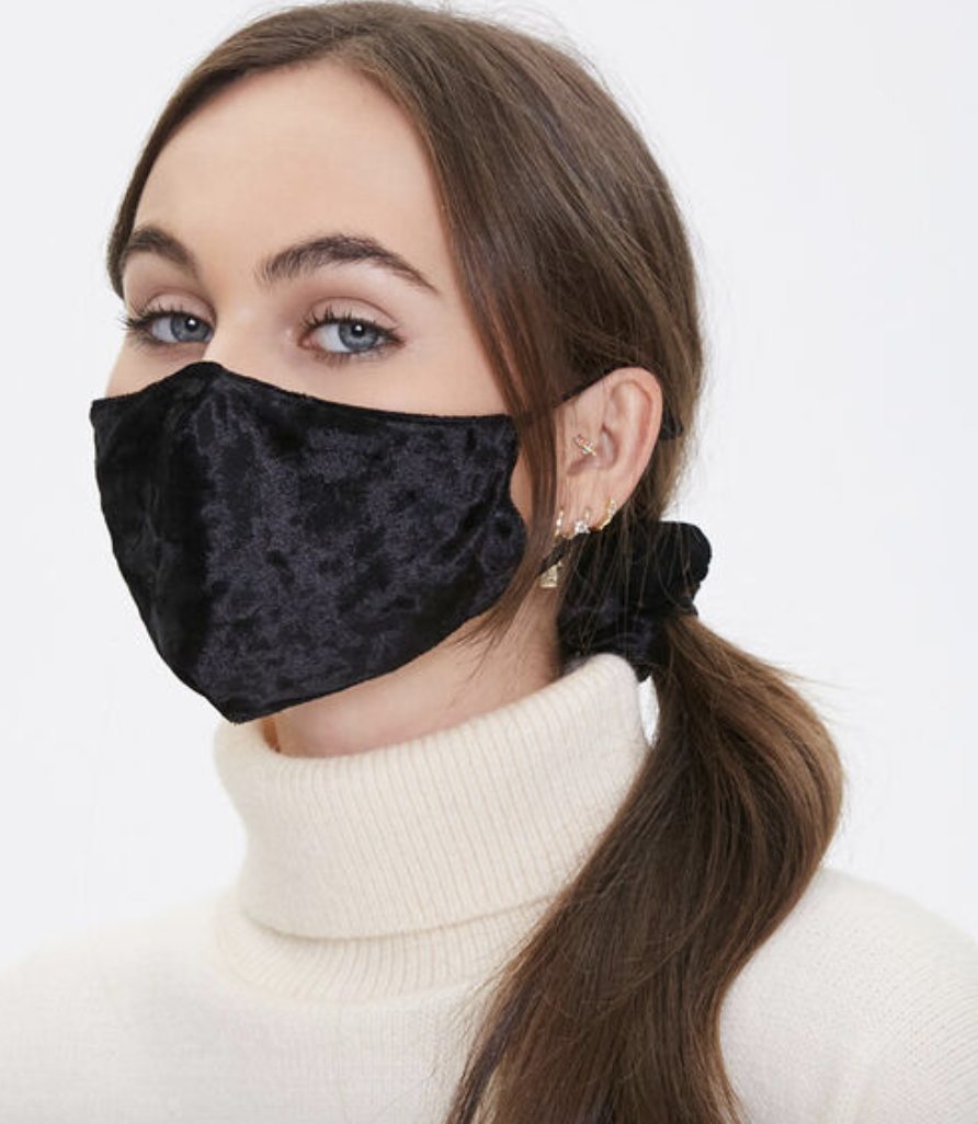 Model in black velvet face mask