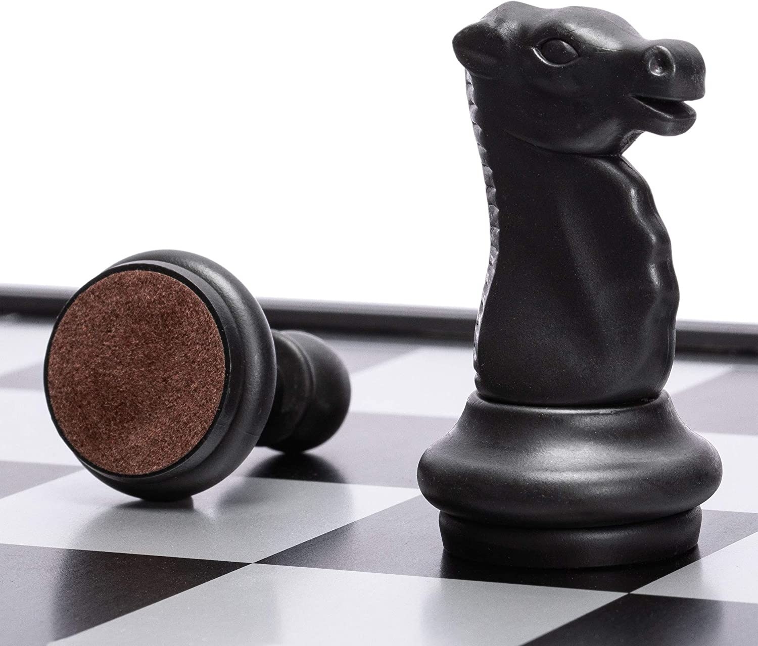 Two chess pieces on a chess board 