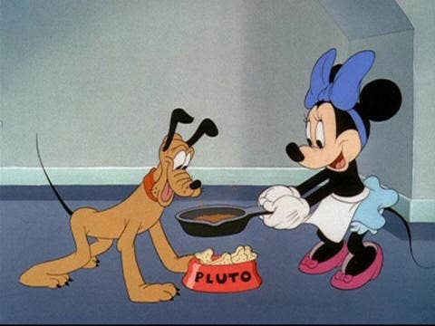 Minnie holding a skillet with bacon fat on it over Pluto&#x27;s dog bowl full of bones as Pluto looks on