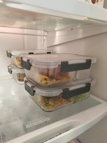 Reviewer photo of four meal prep containers inside fridge