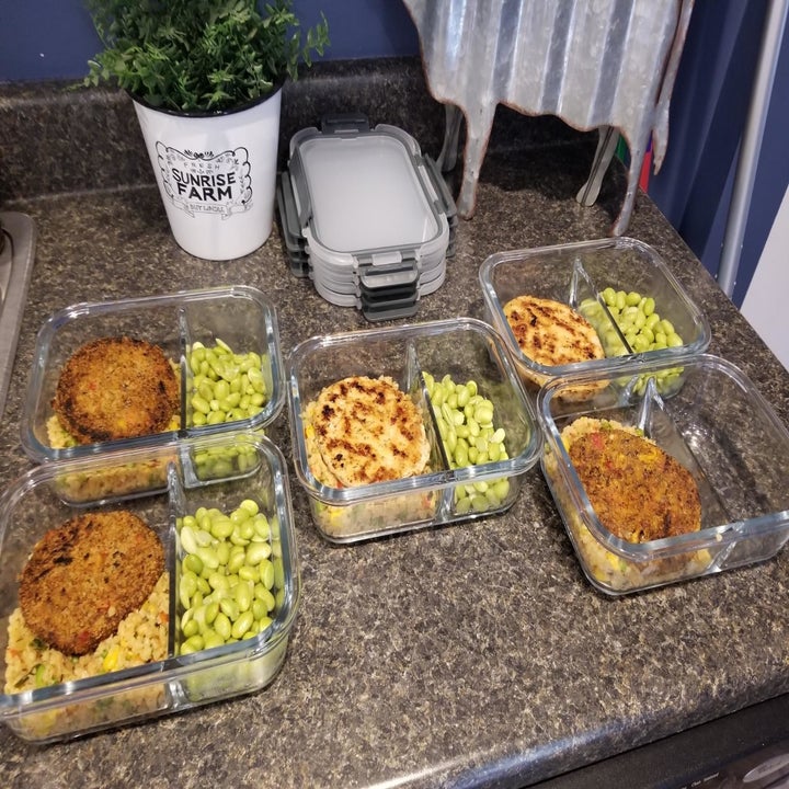 Reviewer photo of five meal prep containers with food inside