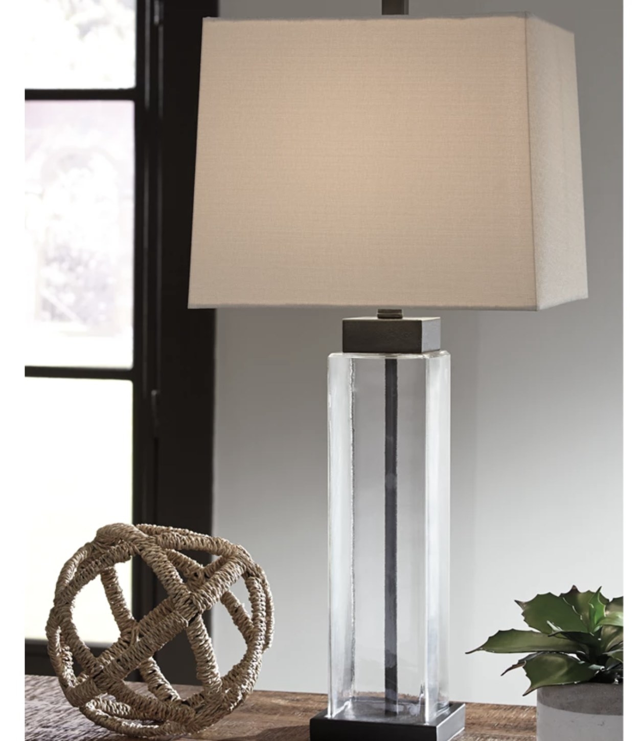 A glass table lamp