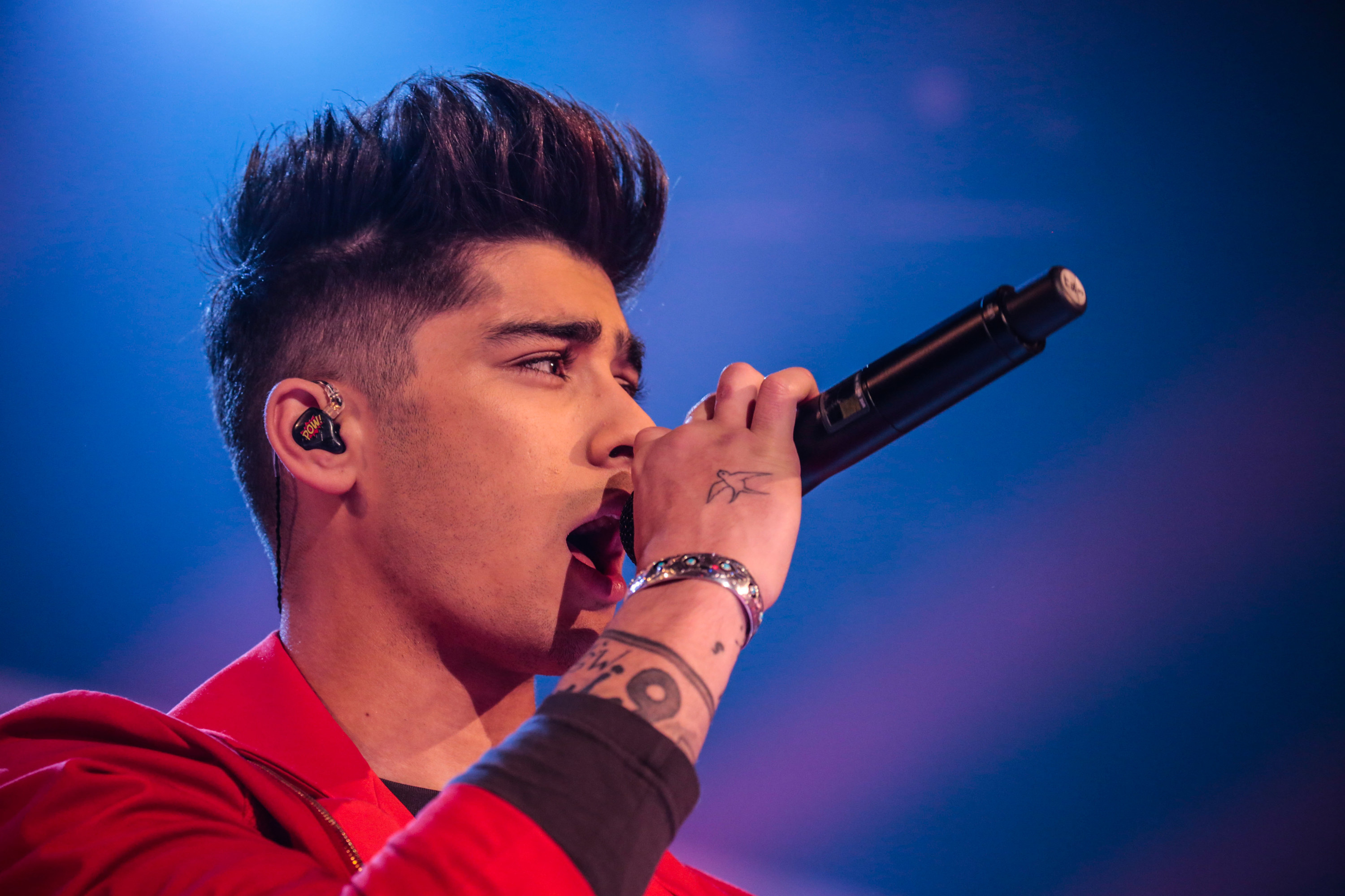 Zayn singing onstage