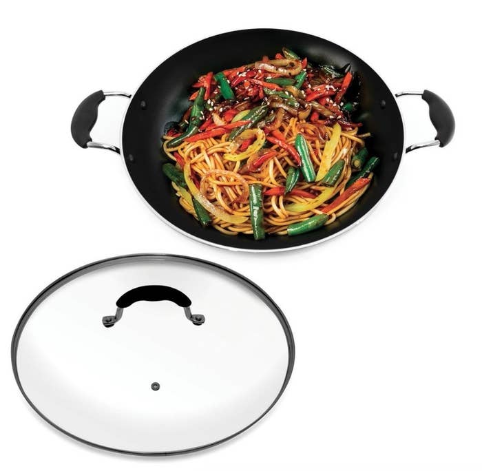 A Starfrit Jumbo 13.5-Inch Wok with a lid