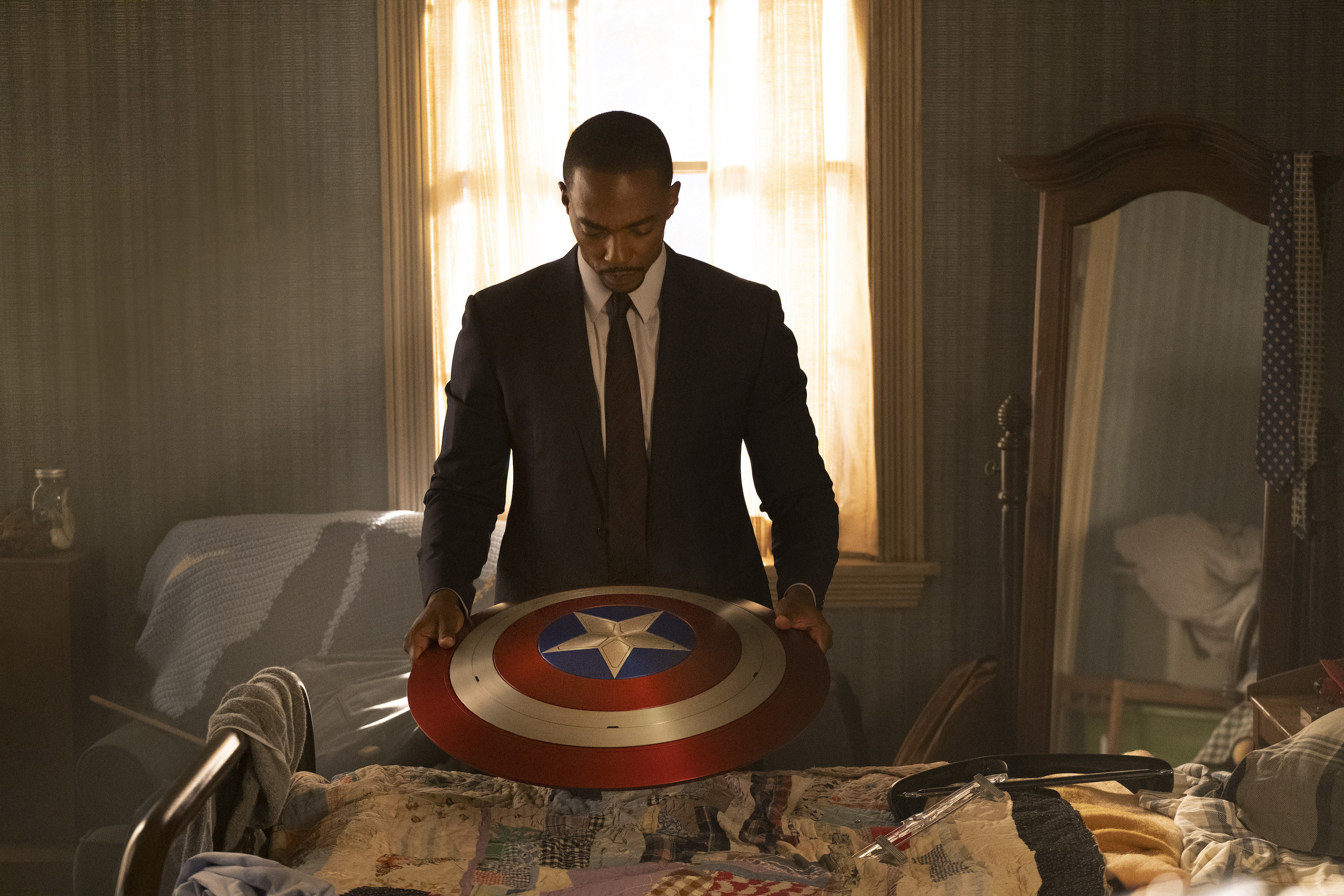 Sam Wilson holding the Captain America shield