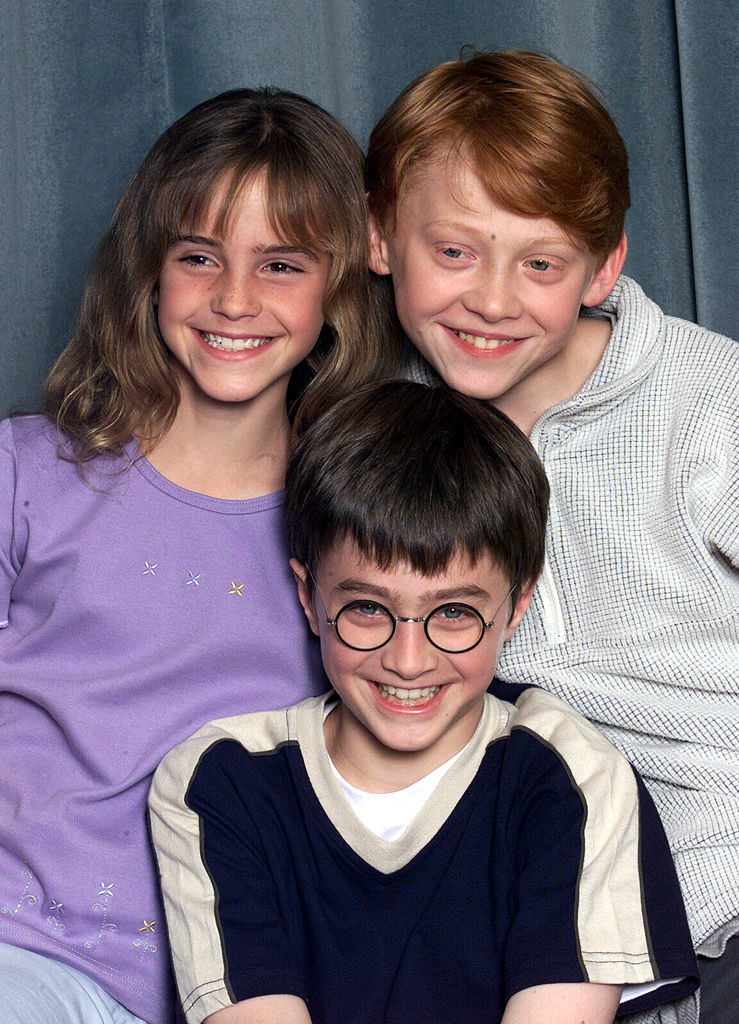  Emma Watson (L), Daniel Radcliffe (C) and Rupert Grint (R) attend a press conference for the movie &quot;Harry Potter and The Philosopher&#x27;s Stone&quot; in London