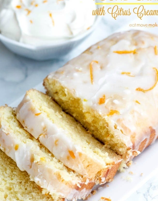 A citrus pound cake with icing cut into slices.
