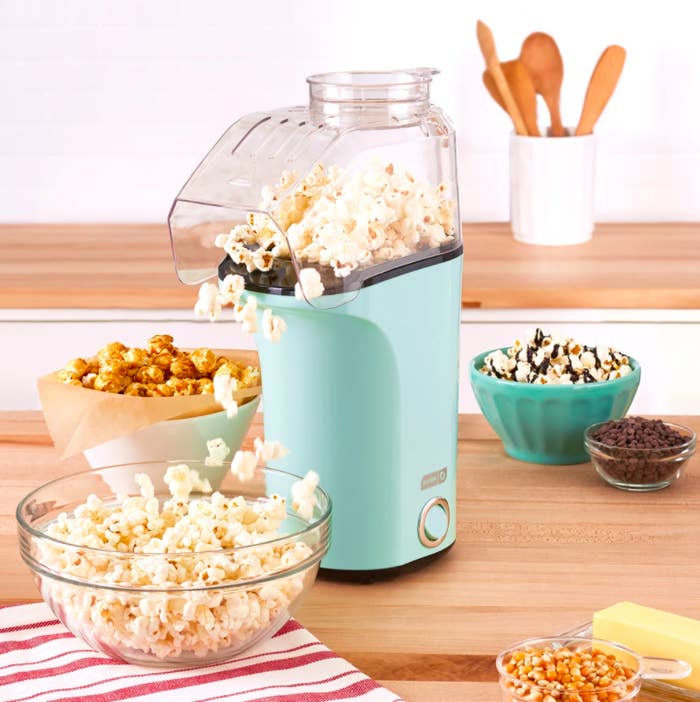 The popper making a bowl of popcorn