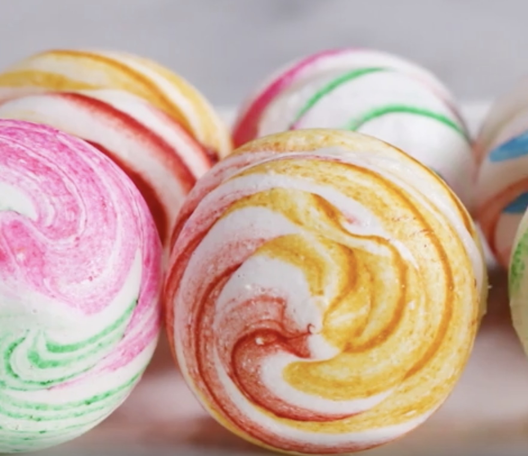 The meringues in different colored swirls