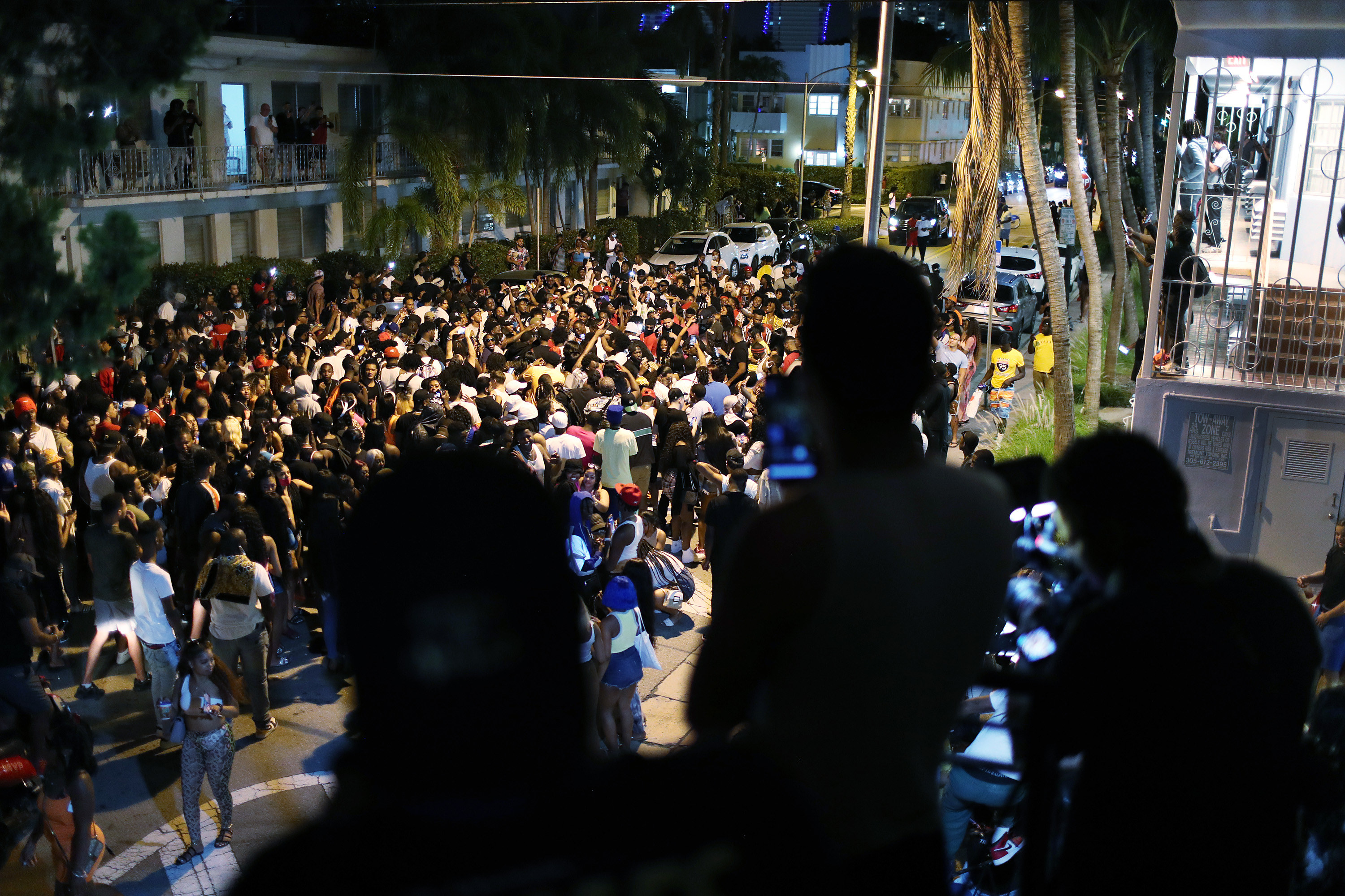 A crowded street at night