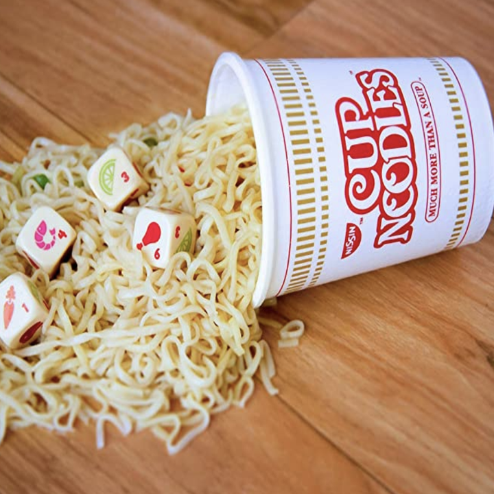 yahtzee cup that looks like a cup of noodles and dice with ramen ingredients on them