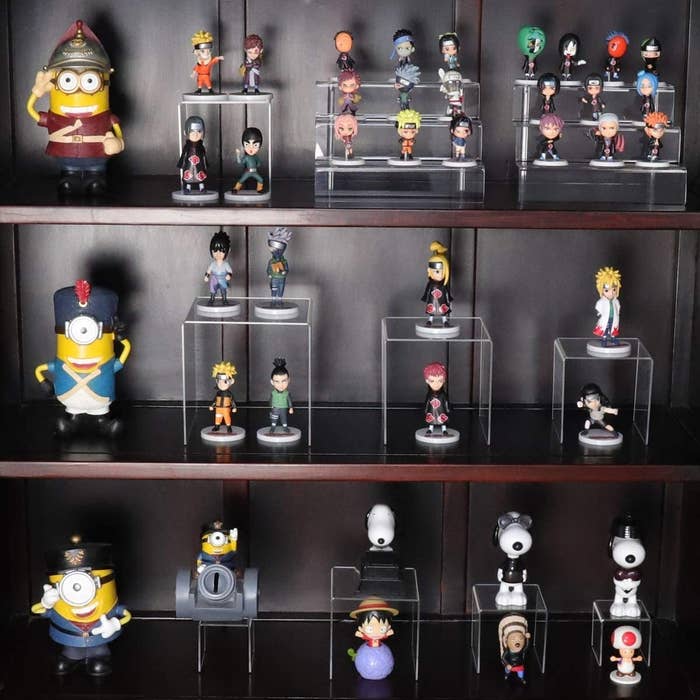 figurines displayed on acrylic stands