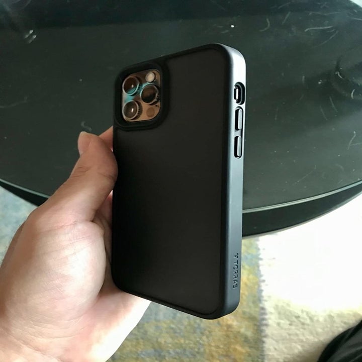 a reviewer's phone case in black