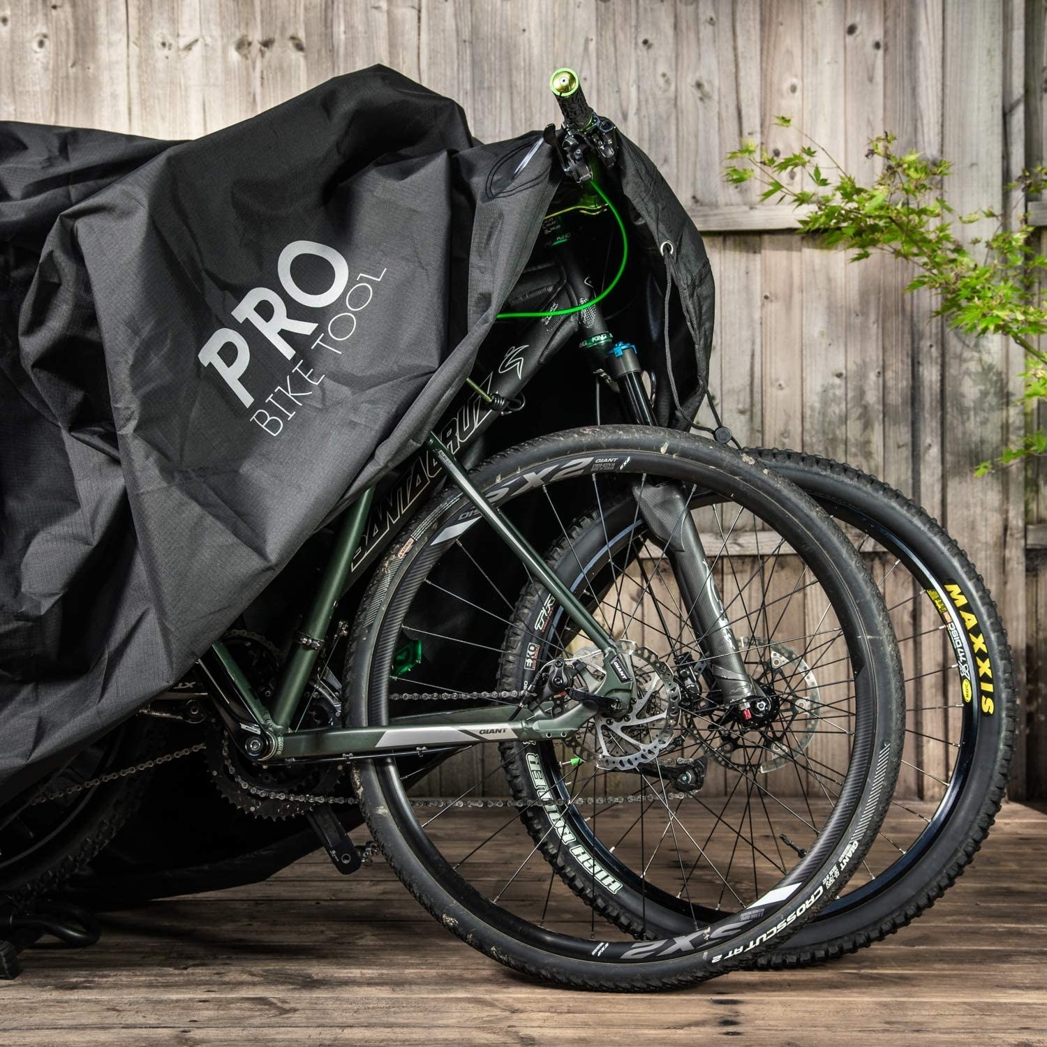 Two bikes underneath the bike cover
