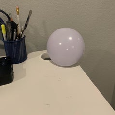 a reviewer of the same desk and the round light turned off 