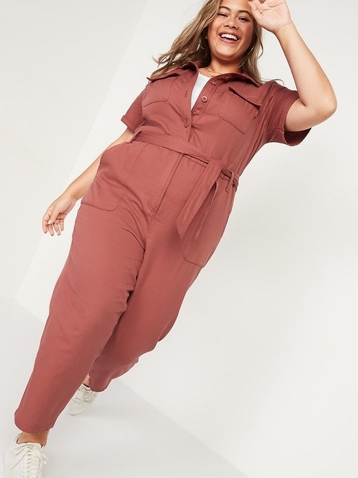 Model in the jumpsuit with removable tie belt